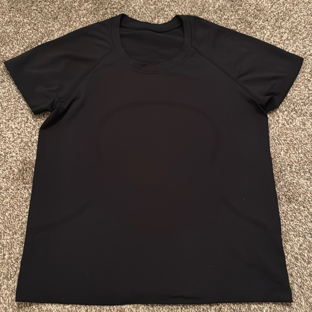 Lululemon swiftly tech shirt in size 6. Black. Good condition.